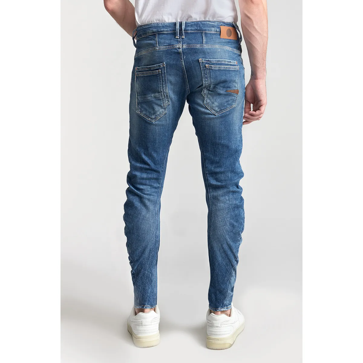 Jeans tapered , largo 34