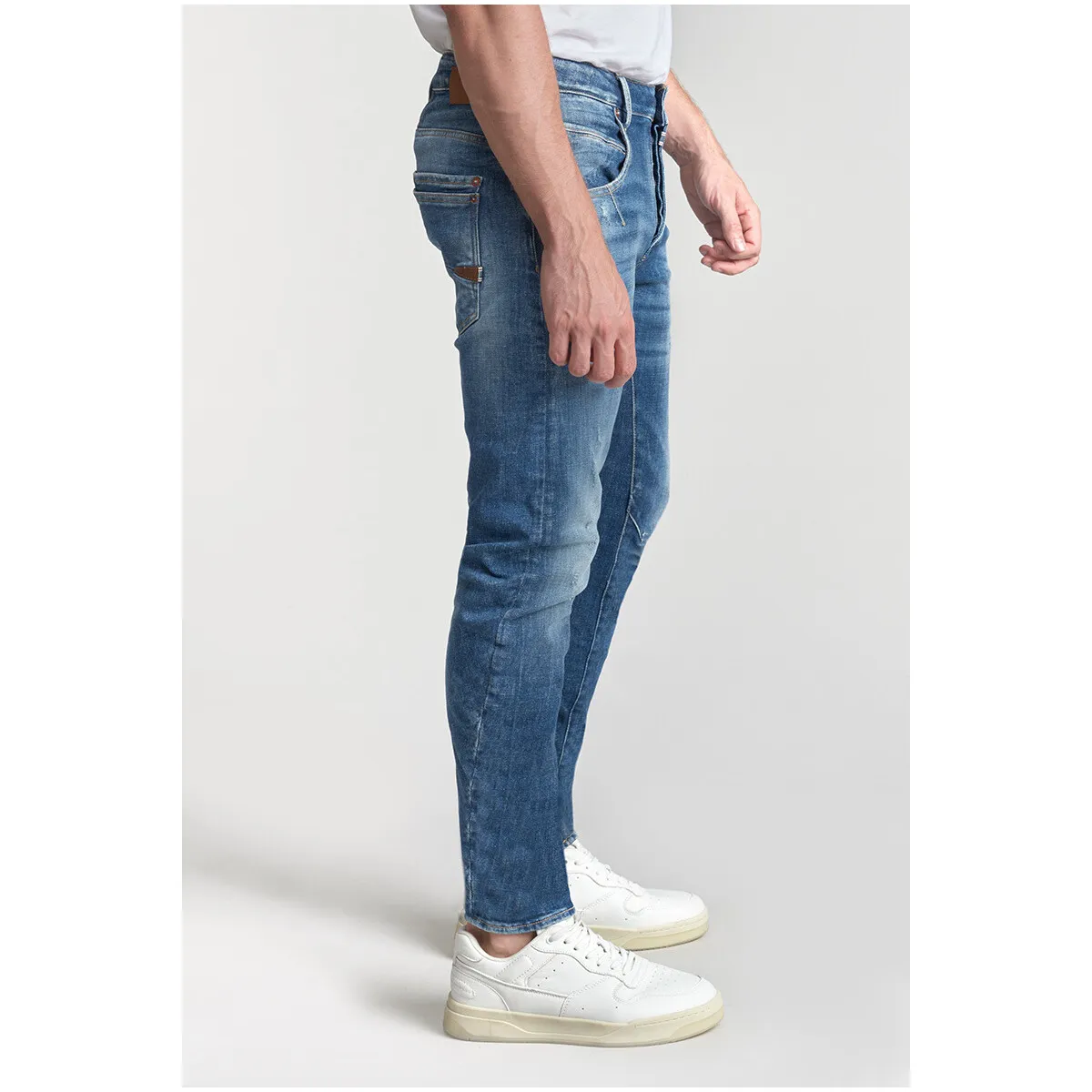 Jeans tapered , largo 34