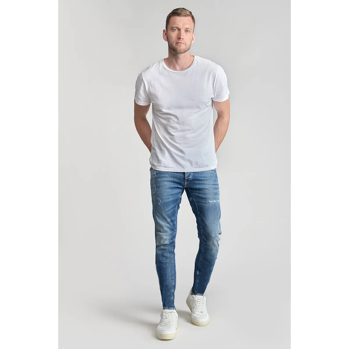 Jeans tapered , largo 34